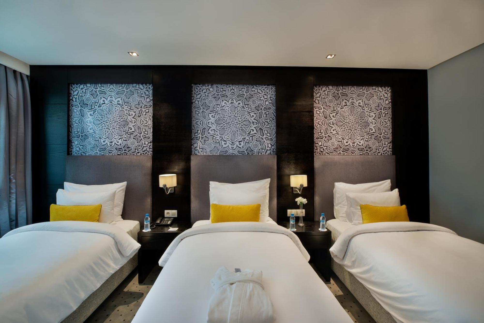 Deluxe Triple Room
